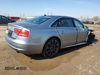 2012 Audi A8 with VIN WAURVAFD8CN018131, listed as a Copart auction lot 54260395 with 98,706 mi miles and Salvage title. Bid and sale history available at DreamBid. Image 3.