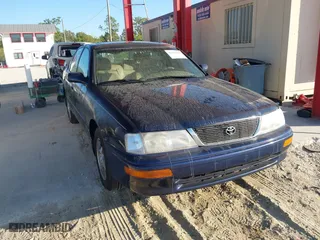 1997 Toyota Avalon XL with VIN 4T1BF12B0VU159964, listed as a IAAI auction lot 41457391 with 173,617 mi miles. Bid and sale history available at carsss.com. Image 1.