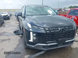 2024 Hyundai Palisade SEL z VIN KM8R44GEXRU806546, wystawiony jako IAAI lot #42140795 z przebiegiem 11 729 mil mil oraz . Historia ofert i sprzedaży dostępna na DreamBid. Obrazek 1.