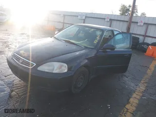 1999 Honda Civic EX with VIN 1HGEJ8644XL037266, listed as a IAAI auction lot 41254910 with 171,509 mi miles. Bid and sale history available at carsss.com. Image 17.