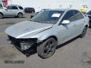 2004 Mazda 6 i with VIN 1YVFP80CX45N15167, listed as a IAAI auction lot 42213405 with Not Provided miles and . Bid and sale history available at DreamBid. Image 2.