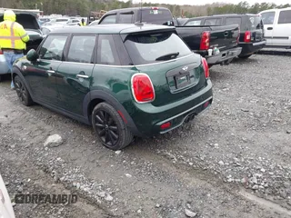 2016 MINI Cooper Hardtop 4 Door S with VIN WMWXU3C58G2D31595, listed as a IAAI auction lot 41267547 with 145,191 mi miles. Bid and sale history available at carsss.com. Image 3.