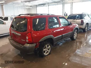 2006 Mazda Tribute S with VIN 4F2YZ06196KM14531, listed as a IAAI auction lot 41594920 with 297,204 mi miles and . Bid and sale history available at carsss.com. Image 4.