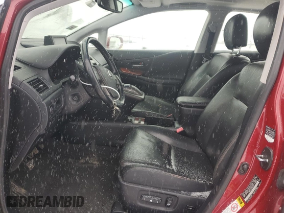 2010 Lexus HS 250h with VIN JTHBB1BA9A2005121, listed as a Copart auction lot 87825175 with 124,594 mi miles and Salvage Title. Bid and sale history available at DreamBid. Image 7.