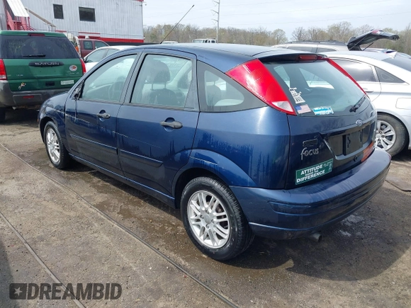 2004 Ford Focus ZX5 z VIN 3FAFP37334R120359, wystawiony jako IAAI lot #41922026 z przebiegiem 115 789 mil mil oraz . Historia ofert i sprzedaży dostępna na DreamBid. Obrazek 3.