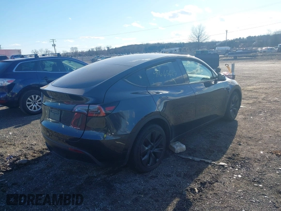 2024 Tesla Model Y Long Range with VIN 7SAYGAEEXRF212415, listed as a IAAI auction lot 41665627 with Not Provided miles and . Bid and sale history available at DreamBid. Image 4.