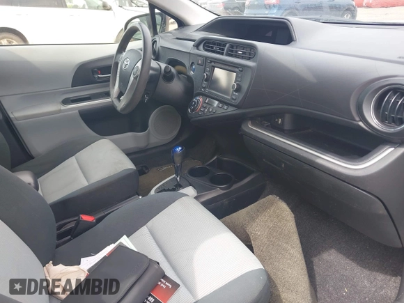 2014 Toyota Prius One with VIN JTDKDTB32E1074592, listed as a IAAI auction lot 42078851 with Not Provided miles and . Bid and sale history available at DreamBid. Image 5.