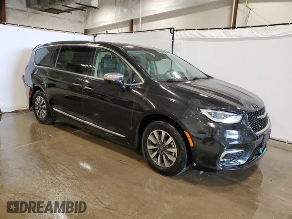 2023 Chrysler Pacifica Hybrid Limited with VIN 2C4RC1S75PR626237, listed as a Copart auction lot 60257305 with 61,864 mi miles and Salvage title. Bid and sale history available at DreamBid. Image 4.