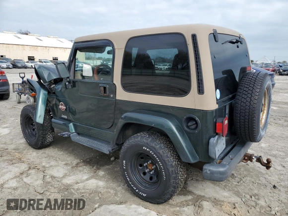 2002 Jeep Wrangler Sahara with VIN 1J4FA59S22P712913, listed as a Copart auction lot 43350115 with 86,320 mi miles and Salvage Title. Bid and sale history available at carsss.com. Image 2.