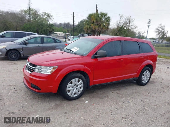 2013 Dodge Journey SE with VIN 3C4PDCAB5DT713666, listed as a IAAI auction lot 41666251 with 198,798 mi miles. Bid and sale history available at carsss.com. Image 2.