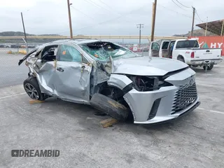 2023 Lexus RX 350h with VIN 2T2BBMCA1PC011986, listed as a IAAI auction lot 42153668 with Not provided miles and . Bid and sale history available at DreamBid. Image 1.