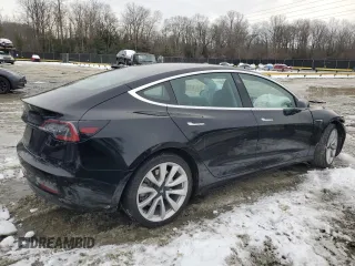 2020 Tesla Model 3 Standard Range Plus with VIN 5YJ3E1EAXLF661031, listed as a Copart auction lot 87912605 with Not Provided miles and Salvage Title. Bid and sale history available at DreamBid. Image 3.