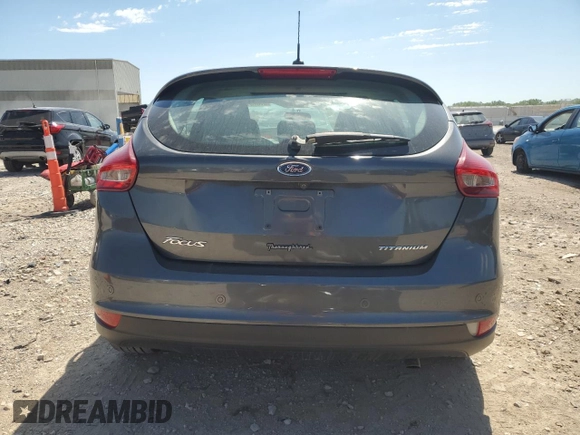 2017 Ford Focus Titanium с VIN 1FADP3N2XHL287713, выставлен на аукционе Copart как лот 57823155 с пробегом 51 828 миль миль и Списание • Salvage title. История ставок и продаж доступна на DreamBid. Изображение 6.
