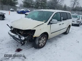 2009 Dodge Grand Caravan with VIN 2D8HN11E19R703857, listed as a IAAI auction lot 41195565 with 199,776 mi miles and . Bid and sale history available at DreamBid. Image 2.