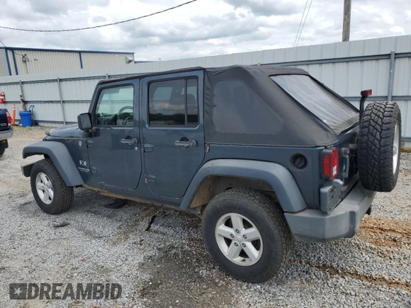 2007 Jeep Wrangler Unlimited X with VIN 1J4GA39117L119395, listed as a Copart auction lot 52588055 with 160,335 mi miles and Salvage title. Bid and sale history available at DreamBid. Image 2.