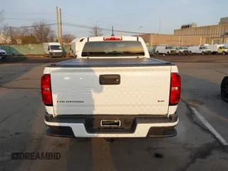 2021 Chevrolet Colorado 4WD Work Truck with VIN 1GCGTBEN5M1146688, listed as a IAAI auction lot 41795648 with 20,549 mi miles and . Bid and sale history available at DreamBid. Image 16.