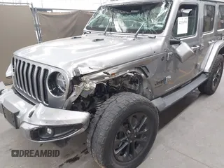 2021 Jeep Wrangler Unlimited Sahara with VIN 1C4HJXEN1MW529568, listed as a IAAI auction lot 42336590 with 39,931 mi miles and . Bid and sale history available at DreamBid. Image 6.