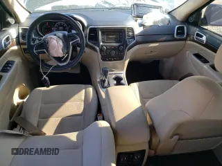 2017 Jeep Grand Cherokee Laredo with VIN 1C4RJEAG4HC952605, listed as a Copart auction lot 56693145 with 115,035 mi miles and Salvage title. Bid and sale history available at DreamBid. Image 8.