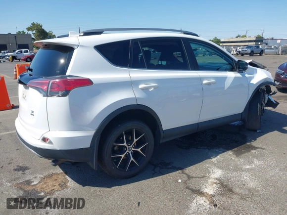2017 Toyota RAV4 SE with VIN 2T3JFREV0HW609611, listed as a IAAI auction lot 42618053 with 85,915 mi miles and . Bid and sale history available at DreamBid. Image 4.