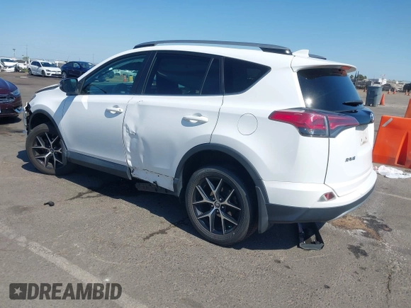 2017 Toyota RAV4 SE with VIN 2T3JFREV0HW609611, listed as a IAAI auction lot 42618053 with 85,915 mi miles and . Bid and sale history available at DreamBid. Image 3.