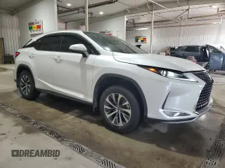 2022 Lexus RX with VIN 2T2HZMDA4NC338142, listed as a Copart auction lot 52144555 with 31,426 mi miles and Salvage Title. Bid and sale history available at carsss.com. Image 4.