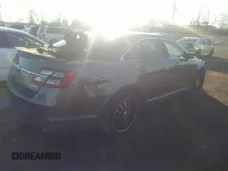 2014 Ford Taurus SHO with VIN 1FAHP2KT4EG140364, listed as a IAAI auction lot 35451709 with 82,904 mi miles. Bid and sale history available at carsss.com. Image 4.