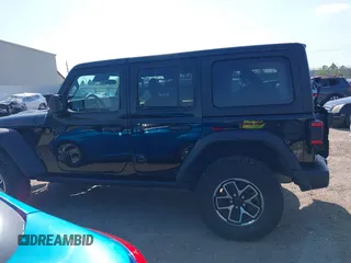 2024 Jeep Wrangler Rubicon with VIN 1C4PJXFG2RW276330, listed as a IAAI auction lot 41866339 with 23,168 mi miles. Bid and sale history available at carsss.com. Image 15.