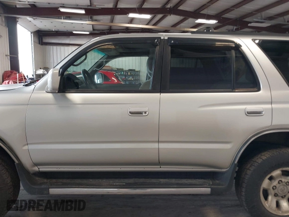 1999 Toyota 4Runner SR5 z VIN JT3HN86R8X0221532, wystawiony jako IAAI lot #41902556 z przebiegiem 406 602 mil mil oraz . Historia ofert i sprzedaży dostępna na DreamBid. Obrazek 15.