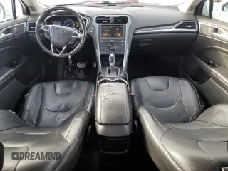 2014 Ford Fusion Titanium with VIN 3FA6P0K94ER277040, listed as a Copart auction lot 88780385 with 131,545 mi miles and Salvage Title. Bid and sale history available at DreamBid. Image 8.