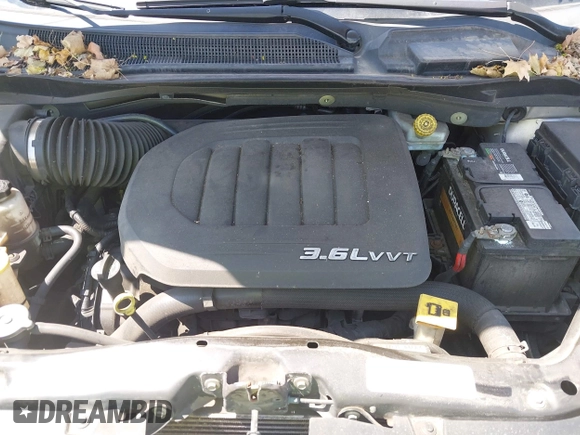 2013 Dodge Grand Caravan SE with VIN 2C4RDGBG9DR642162, listed as a IAAI auction lot 42113378 with 182,370 mi miles and . Bid and sale history available at DreamBid. Image 10.