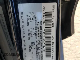2015 Mazda 3 i Grand Touring with VIN JM1BM1W76F1246867, listed as a Copart auction lot 60318265 with 106,757 mi miles and Salvage title. Bid and sale history available at DreamBid. Image 12.