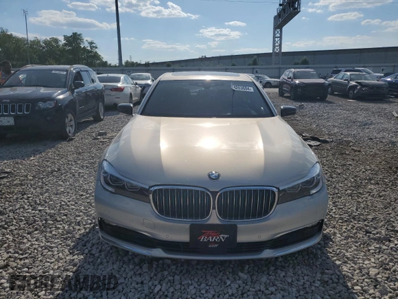 2017 BMW 7 Series 740e xDrive iPerformance with VIN WBA7J2C3XHG497958, listed as a Copart auction lot 58203604 with 75,256 mi miles and Salvage Title. Bid and sale history available at carsss.com. Image 5.