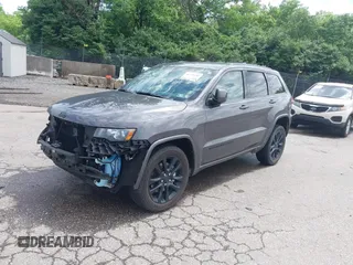 2021 Jeep Grand Cherokee Laredo X with VIN 1C4RJFAG6MC774728, listed as a IAAI auction lot 42270184 with 27,021 mi miles and . Bid and sale history available at DreamBid. Image 19.