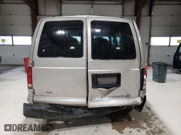 2001 Chevrolet Astro z VIN 1GNEL19W01B143781, wystawiony jako Copart lot #58476275 z przebiegiem 157 888 mil mil oraz Szkoda całkowita • Salvage title. Historia ofert i sprzedaży dostępna na DreamBid. Obrazek 6.