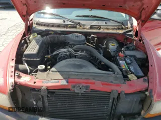 1999 Dodge Dakota SLT z VIN 1B7GL22X6XS243645, wystawiony jako Copart lot #54258675 z przebiegiem 114 362 mil mil oraz Czysty tytuł • Clean title. Historia ofert i sprzedaży dostępna na DreamBid. Obrazek 11.