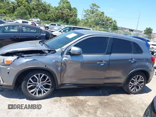 2018 Mitsubishi Outlander SE with VIN JA4AP3AW9JU012575, listed as a IAAI auction lot 42303672 with 97,524 mi miles and . Bid and sale history available at DreamBid. Image 14.