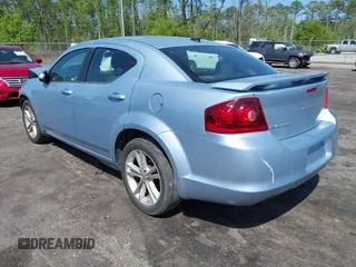 2013 Dodge Avenger SXT with VIN 1C3CDZCB0DN521591, listed as a IAAI auction lot 41891451 with 100,234 mi miles and . Bid and sale history available at carsss.com. Image 3.