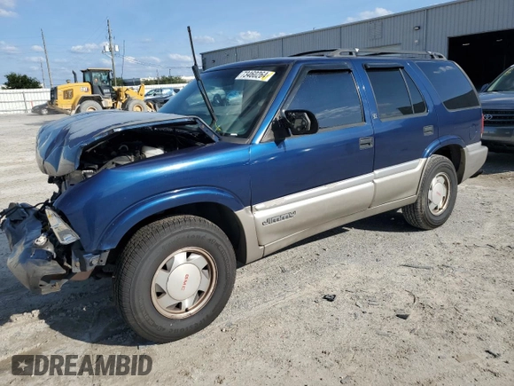2001 GMC Jimmy SL z VIN 1GKCS13WX12112182, wystawiony jako Copart lot #73460264 z przebiegiem Nie podano mil oraz Nie do naprawy • Non repairable. Historia ofert i sprzedaży dostępna na DreamBid. Obrazek 1.