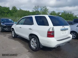 2005 Acura MDX Touring with VIN 2HNYD18695H545777, listed as a IAAI auction lot 42050248 with 207,377 mi miles. Bid and sale history available at carsss.com. Image 3.