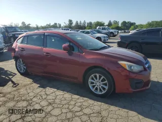 2012 Subaru Impreza Premium with VIN JF1GPAC65CH204935, listed as a Copart auction lot 62145135 with 149,437 mi miles and Salvage title. Bid and sale history available at DreamBid. Image 4.