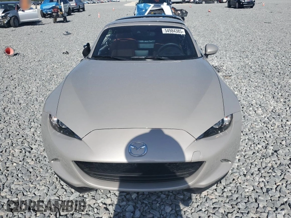 2023 Mazda MX-5 Miata Grand Touring z VIN JM1NDAM70P0551336, wystawiony jako Copart lot #54984385 z przebiegiem 10 948 mil mil oraz Szkoda całkowita • Salvage title. Historia ofert i sprzedaży dostępna na DreamBid. Obrazek 5.