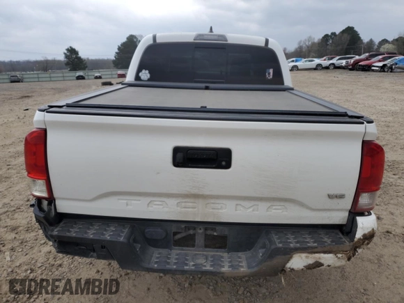 2017 Toyota Tacoma SR5 z VIN 3TMAZ5CN1HM047528, wystawiony jako Copart lot #49260315 z przebiegiem 78 361 mil mil oraz Szkody całkowita. Historia ofert i sprzedaży dostępna na DreamBid. Obrazek 6.