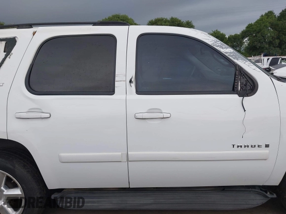 2007 Chevrolet Tahoe LS with VIN 1GNFC13J97R281157, listed as a IAAI auction lot 42167329 with Not provided miles and . Bid and sale history available at DreamBid. Image 14.