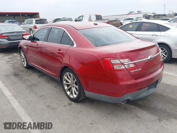 2013 Ford Taurus Limited with VIN 1FAHP2F84DG127859, listed as a IAAI auction lot 41913310 with 196,620 mi miles and . Bid and sale history available at DreamBid. Image 3.