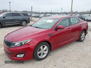2015 Kia Optima LX with VIN 5XXGM4A72FG357449, listed as a IAAI auction lot 42079075 with 136,042 mi miles. Bid and sale history available at carsss.com. Image 2.