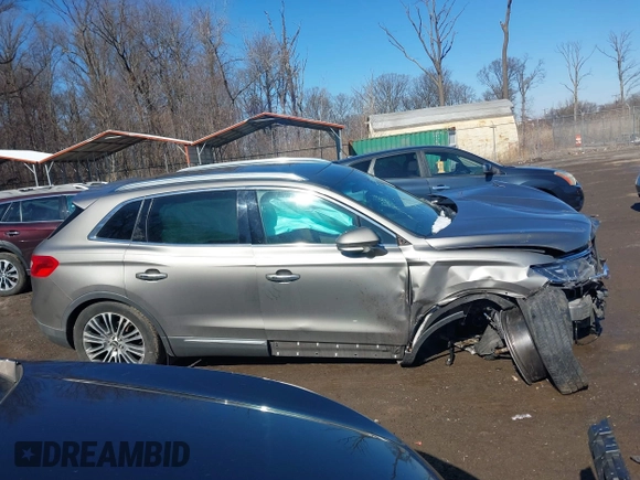 2016 Lincoln MKX Reserve with VIN 2LMTJ6LR7GBL90370, listed as a IAAI auction lot 41578776 with Not Provided miles and . Bid and sale history available at DreamBid. Image 14.