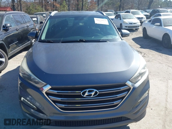 2016 Hyundai Tucson Limited with VIN KM8J33A26GU075023, listed as a IAAI auction lot 41656851 with 125,277 mi miles and . Bid and sale history available at DreamBid. Image 12.