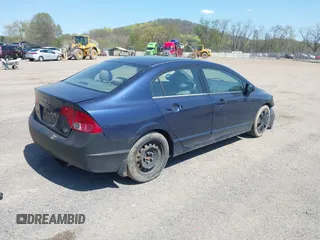 2007 Honda Civic Sdn LX with VIN 1HGFA16547L034503, listed as a IAAI auction lot 42063562 with 181,281 mi miles. Bid and sale history available at carsss.com. Image 4.
