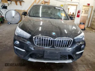2018 BMW X1 xDrive28i with VIN WBXHT3C31J5L24230, listed as a Copart auction lot 56665305 with Not provided miles and Non repairable. Bid and sale history available at DreamBid. Image 5.