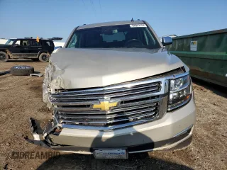 2015 Chevrolet Tahoe LTZ z VIN 1GNSKCKC5FR100084, wystawiony jako Copart lot #68003764 z przebiegiem Nie podano mil oraz Czysty tytuł • Clean title. Historia ofert i sprzedaży dostępna na DreamBid. Obrazek 5.